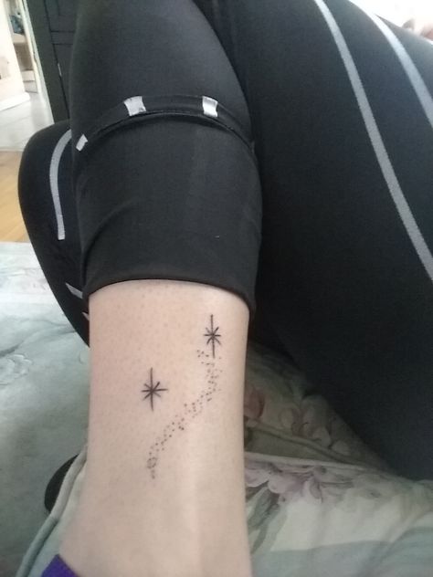 Second star to the right , pixie dust, ankle/leg, Peter Pan Pixie Dust Tattoo Ideas, Tattoo Second Star To The Right, The Second Star To The Right Tattoo, Subtle Peter Pan Tattoo, Neverland Stars Tattoo, Pixie Dust Tattoo Stars, Peter Pan Compass Tattoo, Peter Pan Tattoo Star, Fairy Dust Tattoo Stars