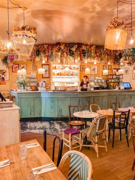 21 of the Cutest Parisian Cafés You Need To Visit - Landry Has Landed Cafe Winter Aesthetic, Velvet Couch Coffee Shop, Cafe Interior Ideas, Fancy Cafe, Tea Cafe Interior Ideas, French Cafe Interior, 90s Cafe, Cafe Decoration Ideas, Parisian Cafe Aesthetic