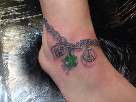 ankle bracelet tattoo with peace sign, clover, double heart charms Tattoo Ankle Bracelet, Tattoos Anchor, Charm Bracelet Tattoo, Bracelet Tattoos, Charm Tattoo, Tattoo Ankle, Chain Tattoo, Ankle Bracelet Tattoo, Ankle Tattoo Designs