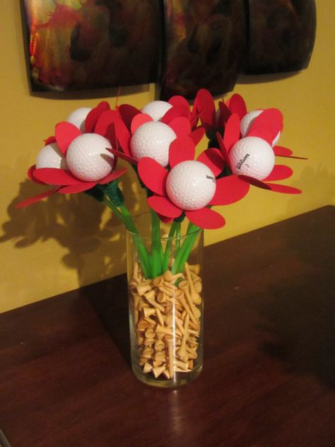 golf ball bouquet Golf Bouquets, Golf Ball Gift Ideas, Golf Ball Bouquet, Golf Balls Crafts Ideas, Golf Ball Art Diy, Golf Ball Flowers, Golf Valentines Gift, Golf Table Decorations, Golf Ball Art