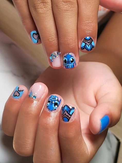 Unleash your personality with our Nail Art Extravaganza, featuring your favorite cartoons, movies, and snacks. From nostalgic animations to blockbuster hits and tasty treats, our collection offers creative and playful designs to adorn your nails. Perfect for movie nights or just to bring some fun into your daily look. #NailArtIdeas #CartoonNails #MovieNailDesigns #SnackNailArt Stitch Nails Short Easy, Stitch Birthday Nails, Lilo And Stitch Nails For Kids, Stitch Nail Designs Short, Stitch Gel Nails, Easy Stitch Nails, Gel Nails Disney, Stitch Nails For Kids, Stitch Nails Disney