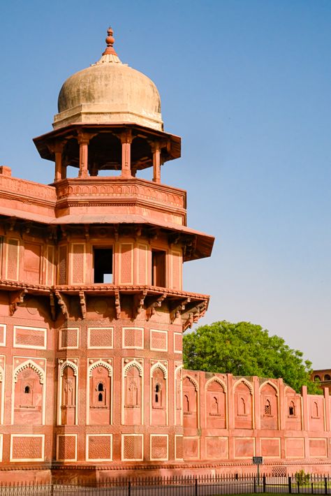 In India’s “City of Love,” kites soar over rooftops amidst the backdrop of a sandstone-red sunset. On the banks of the Yamuna River, the Taj Mahal, one of the seven wonders of the world, becomes a spectacle in pink washed in golden light. Spend at least one day here in Agra, basking in the Taj Mahal, wandering the gardens of “Baby Taj” and the marble floors of Agra Fort. Agra Fort Aesthetic, Yamuna River, Seven Wonders Of The World, Agra Fort, Trip Aesthetic, India Trip, Marble Floors, Agra India, Red Sunset