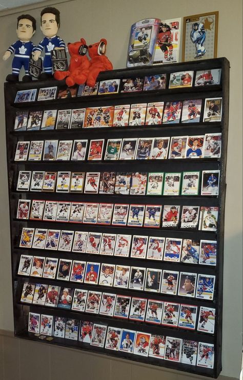 Sports Collectibles Display, Sports Memorabilia Display Ideas, Hockey Card Display Ideas, Sports Cards Storage Cabinet, Baseball Card Display Ideas, Sport Card Display Ideas, Sports Cards Display Ideas, Card Collection Display, Trading Card Display Ideas