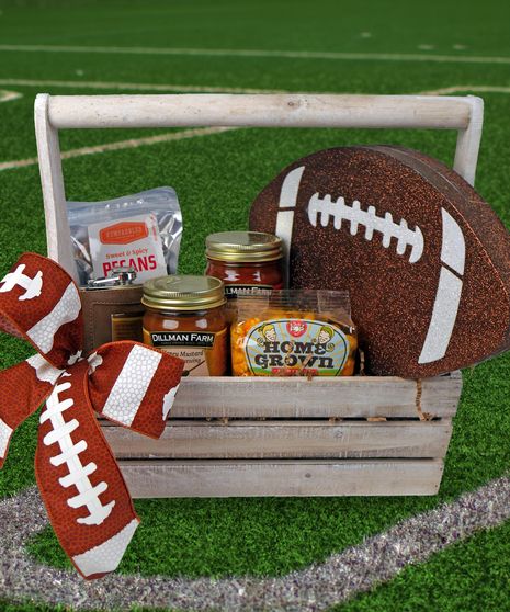 GIFT BASKET, FOOTBALL, SUPER BOWL, GIFTS This football crate is overflowing with local goodies meant for the big game! Enjoy "Indy Style" popcorn from Just Pop In, Salsa and Honey Mustard Dipping Sauce from Dillman Farm, Sweet & Spicy Pecans from Newfangled confections, and a flask (where you can enjoy whatever you would like!)  Decorated with a giant foam football and football ribbon, ready to rumble! Football Bouquet Gift Ideas, Football Raffle Basket Ideas, Tailgate Basket Ideas, Basket Raffle Ideas Unique, Senior Night Baskets Football, Football Gift Baskets, Super Bowl Gifts, Quarter Auction, Chicago Bears Gifts