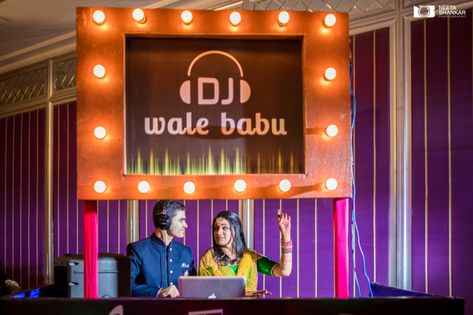 A fun DJ counter for a cocktail function | WedMeGood| #wedmegood #indianweddings #DJ #counter #cocktail #dance #music Garden Wedding Ceremony Arch, Punjabi Decor, Bollywood Party Decorations, Sangeet Ideas, Bombay Velvet, College Fest, Dj Console, Shaadi Decor, Bollywood Theme Party