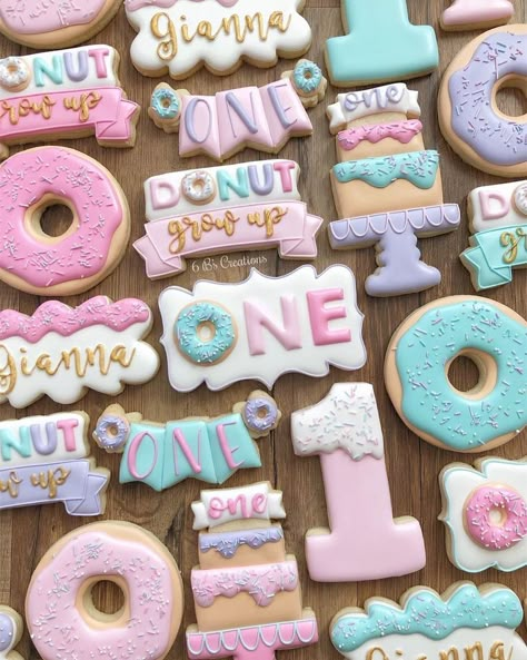 Brittany Geil on Instagram: “Donut Grow Up cookies for a first birthday!! I loved being able to put a girly spin on this cookie set I did last year! I didn’t have any…” Up First Birthday Party, Donut Grow Up First Birthday, Up Cookies, Doughnut Party, First Birthday Party Ideas, Donut Themed Birthday Party, First Birthday Cookies, 1st Birthday Party For Girls, Birthday Donuts