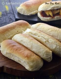 Hot Dog Roll, Homemade Hot Dog Roll recipe | by Tarla Dalal | Tarladalal.com | #41669 Homemade Hot Dog Buns, Homemade Hot Dogs, Italian Snacks, Hot Dog Rolls, Bun Recipe, Bread Recipes Homemade, Bread Rolls, Dinner Rolls, Rolls Recipe