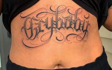 Belly Writing Tattoo, Name On Stomach Tattoo, Script Stomach Tattoo, Old English Stomach Tattoo, Stomach Tattoos Lettering, Stomach Lettering Tattoo Women, Stomach Tattoos Women Words, Cholo Tattoo Ideas, Tattoo Belly