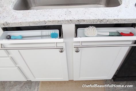 Turn those fake drawer panels that serve very little purpose directly under your sink into hidden storage. Under Kitchen Sink, Kitchen Sink Cabinet, Best Kitchen Sinks, Kitchen Sink Organization, Kitchen Sink Storage, Hidden Kitchen, Under Sink Organization, Sink Storage, Sink Organizer