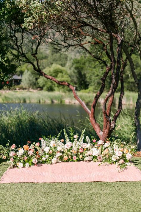 Floral Ground Alter, Grounded Arch Wedding, Outdoor Meadow Wedding, Spring Wedding Arbor Ideas, Wedding Arch Ground Flowers, Non Arch Wedding Alter, Grounded Flowers Wedding, Grounded Ceremony Flowers, Floral Nest Wedding Ceremony