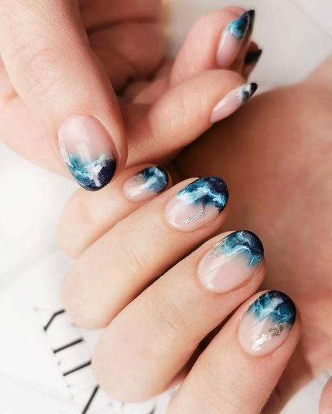 Summer is officially here and that means endless beach days. Match your nails to your vacation plans with these beach nail art designs. #beach #nail #nailart Beach Nail Art Designs, Ocean Nail Art, Hawaiian Nails, Galaxy Nail Art, Beach Nail Art, Wave Nails, Beach Nail Designs, Sea Nails, Beach Nail