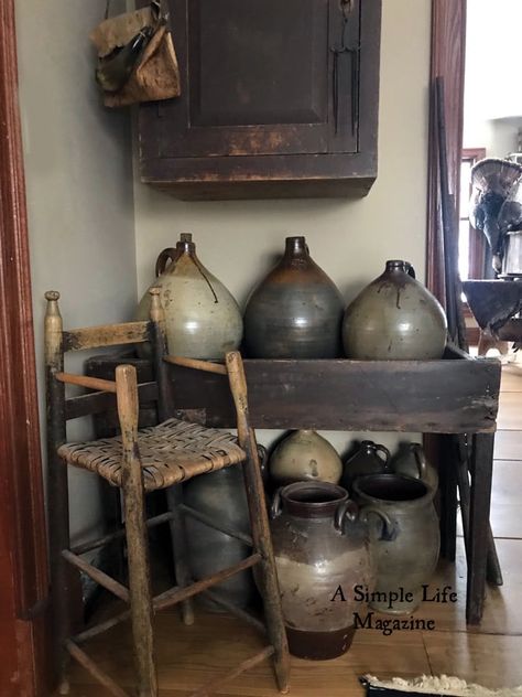 Primitive Crocks, Wrought Iron Accessories, Primitive Living Room, Old Crocks, Primative Decor, Primitive Living, Colored Glass Bottles, Primitive Homes, Primitive Colonial