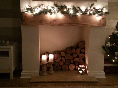 Wood Logs In Fireplace, Wood Filled Fireplace Logs, Wood Stacked In Fireplace, Log Stack Fireplace, Wood Filled Fireplace, Log Filled Fireplace Ideas, Log Filled Fireplace, Wood In Fireplace Stacked, Closed Fireplace Ideas Decor