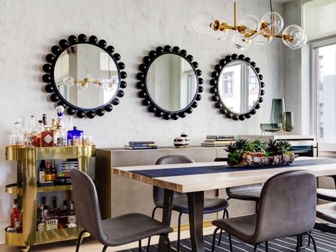 This tried-and-true accessory has never steered us wrong. Use mirrors to reflect your style, bounce light around a room and instantly make a space feel larger. Here's how. Three Mirrors On Wall, Three Mirrors On Wall Ideas, Mirrors On Wall Ideas, Mirror In The Kitchen, Mirrors On Wall, Sleek Fireplace, Billy Ikea, Traditional Kitchen Cabinets, Mirror Decor Ideas