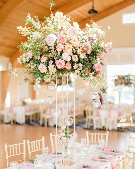 30 Rose Centerpieces That Will Upgrade Your Reception Tables #WeddingCenterpieces #RoseCenterpieces #WeddingFlowers #WeddingInspiration | Martha Stewart Weddings Rose Centerpieces Wedding, Wedding Table Pink, Pink Wedding Receptions, Lantern Centerpiece Wedding, Tall Wedding Centerpieces, Simple Wedding Centerpieces, Rose Centerpieces, Centerpieces Wedding, Wedding Floral Centerpieces