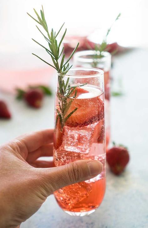 This simple Sparkling Strawberry Sangria is only 5 ingredients and the perfect cocktail to serve at all your summer parties! Light, refreshing, and easy to prepare ahead of time. #cocktail #sangria #happyhour Sangria For Party, Easy Fancy Cocktails, Fancy Alcoholic Drinks, Fancy Cocktail Recipes, Sangria Prosecco, Fancy Non Alcoholic Drinks, Fresh Summer Cocktails, Fancy Cocktails Recipes, Sparkling Sangria