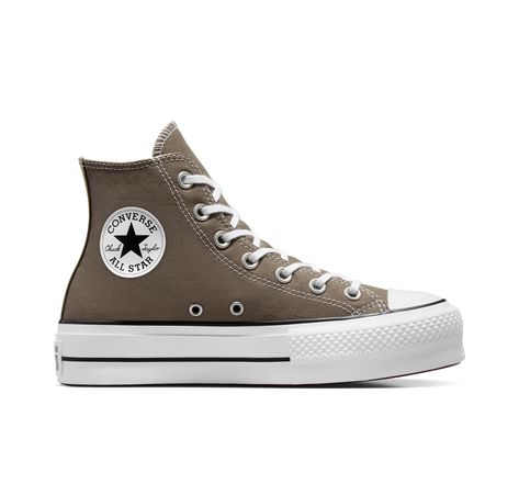 Classic Chucks, leveled up. The Chuck Taylor All Star has morphed since its creation in 1917. Still, despite the everchanging landscape of fashion and decades’ worth of trends, the everyday icon lives on. A simple design, a timeless silhouette, an unmistakable ankle patch— something familiar for every iteration of you, no matter where your style might lead you next. Converse Chuck Taylor All Star Lift Platform Canvas For Women In Grey, Size 7 Platform Chuck Taylors, Shoes Converse Black, Brown Chucks, Grey Platform Converse, Fall Converse, Converse Hightops, Cute Shoes Converse, Brown Platform Converse, Shoes Converse