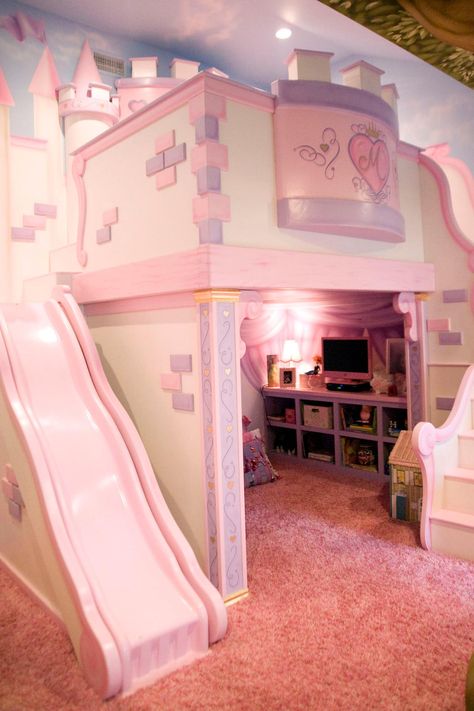 This playful pink bedroom is any little princess's dream. The custom castle features a cozy loft bed nestled within fortress walls and a slide down to the princess play area. Castle Bedroom Kids, Princess Castle Bed, Bed For Girls Room, Girls Bedroom Sets, Princess Bedrooms, Castle Bed, Castle Bedroom, Unicorn Bedroom, Princess Bedroom