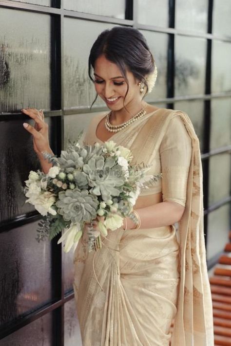 Presenting you latest bridal bouquet. #weddingbazaar #indianwedding #bridalbouquetideas #bridalbouquetwhite #bridalbouquetmodern #bridalbouquetsimple #bridalbouquetdiy #bridalbouquetboho South Indian Wedding Makeup Bridal Looks, Christian Bridal Makeup, Bride Hairstyles Updo, Pose Pengantin, Christian Wedding Gowns, Christian Bridal Saree, Dusky Skin, Christian Bride, White Bridal Gown