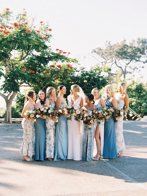 Looking for blue bridesmaid ideas? Look no further than this seaside wedding in shades of blue and pink! Mix Match Blue Bridesmaid Dresses, Pink And Blue Bridesmaid Dresses, Shades Of Pink Bridesmaids, Shades Of Blue Bridesmaid Dresses, Ocean Blue Bridesmaid Dresses, Mixed Bridesmaid Dresses, Mismatched Bridesmaid Dresses Blue, Wedding Pallet, Bridal Party Color Schemes