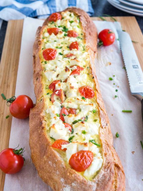 Tomato Feta Stuffed French Bread is so easy to make and bursting with fresh flavors! This bread boat is the ultimate appetizer for your next party but also perfect for a brunch or dinner for two. Dinner Ideas With Bread, Recipes With Bread Slices, Feta Appetizer, Stuffed French Bread, Sustainable Recipes, Bread Boats, Bread Dinner, French Bread Loaf, Tomato Bread