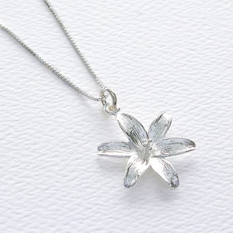 "Sterling Silver Lily Flower Pendant Necklace, Mothers Day Jewelry Gift, Anniversary Necklace, Botanical Blossom Nature Charm, FREE SHIPPING OVERVIEW: * Beautiful, elegant, bright and sturdy 14, 16, 18, or 20 inch chain. Choose from a 0.7 mm, 925 sterling silver box chain or a 1 mm petite 925 sterling silver cable link chain. * Sterling silver lily flower pendant 18 mm width, 24 mm length * All components are 925 sterling silver * Gift box with elastic hair band and charm * Wrapped polishing clo Nature Necklaces, Mothers Day Jewelry, Lily Jewelry, Lily Necklace, Pretty Jewelry Necklaces, Anniversary Necklace, Silver Gift Box, Flower Pendant Necklace, Cool Necklaces