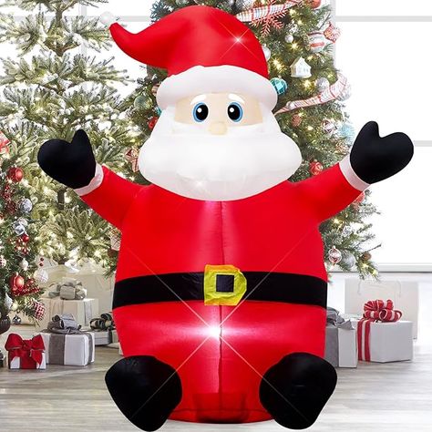 This inflatable Christmas outdoor decoration is cute and charming, with built-in LED lights and a charming lighting effect that flashes at night to attract the attention of neighbors and children, and make your yard eye-catching at Christmas time. This high quality Christmas decoration is easy to install, fast to inflate and easy to store. It includes sandbags, ground piles and rope for easy fixing. suitable for indoor and outdoor. Blow Up Santa, Inflatable Christmas Tree, Inflatable Christmas Decorations, Inflatable Santa, Santa Claus Decorations, Inflatable Decorations, Santa Decorations, Christmas Inflatables, Yard Decorations