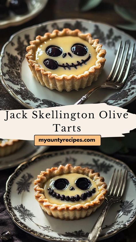 Celebrate Halloween with our Fun Jack Skellington Olive Tarts! These adorable appetizers are made with flaky pastry and filled with cream cheese and olives, creating spooky yet delicious bites. Perfect for Halloween parties, they are easy to assemble and sure to impress your guests. Bring a touch of whimsy to your gathering with these creative and tasty tarts that are sure to be a hit! Cream Cheese And Olives, Cheese And Olives, Halloween Jack Skellington, Cheese Puff Pastry, Tart Filling, Flaky Pastry, Halloween Jack, Halloween Parties, Ricotta Cheese