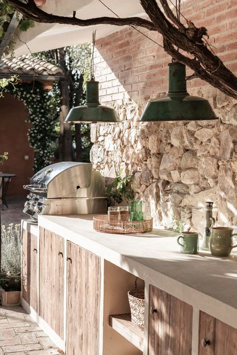 It’s worth saying again and again: materials matter. Brick, stone, rustic wood, microcement, vintage enamel. Every decision impacts the next. It’s a beautiful puzzle.  Design: @espanyolet Kitchen: @santoscocinas Photo: @lifestyle_mallorca Barbacoa Exterior, Rustic Outdoor Kitchen, Antique Pendant Light, Rustic Outdoor Kitchens, Exterior Kitchen, Built In Sofa, Inspiring Interiors, Interior Textiles, Italian Home