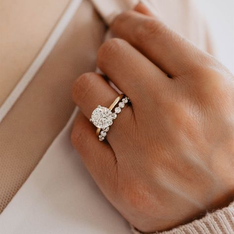 This stunning diamond wedding band features a shared prong setting with .50 carat total weight of diamonds set… Round Solitaire Engagement Ring Gold, Circle Engagement Rings, Gold Band Engagement Rings, Shared Prong Wedding Band, Pretty Engagement Rings, Classic Engagement Ring Solitaire, Cute Engagement Rings, Round Solitaire Engagement Ring, Future Engagement Rings