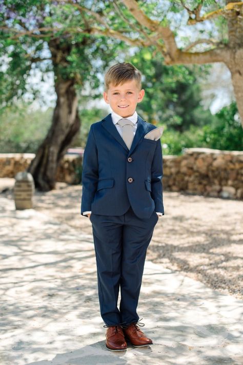 adorable little ring bearer in navy blue Ring Bearer Navy Blue Suit, Navy Blue Ring Bearer Suit, Navy Ring Bearer Outfit, Ring Bearer Outfit Navy Blue, Navy Blue Ring Bearer Outfit, Ring Bearer Navy, Ring Bearer Outfit Navy, Boy Wedding Outfit, Pilot Wedding