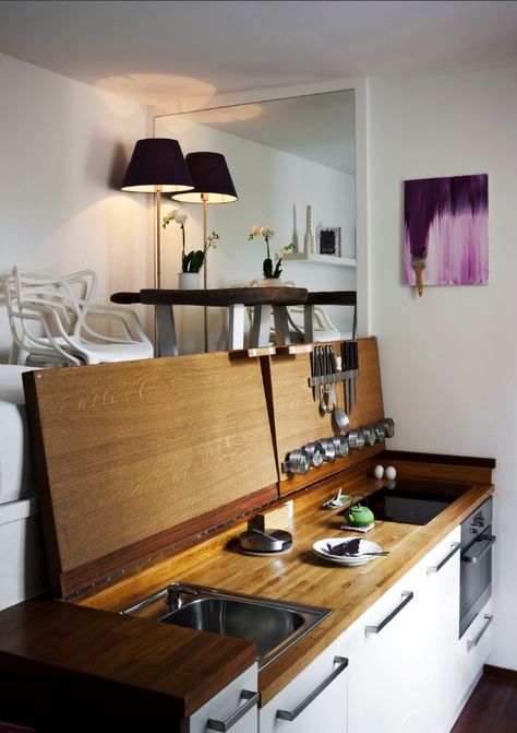 Here's another way to hide the kitchen: put it under the floor : TreeHugger Design Casa Piccola, Tiny Kitchen Design, Micro Apartment, Kabinet Dapur, Tiny House Kitchen, Compact Living, Tiny Spaces, House Design Kitchen, Tiny House Interior