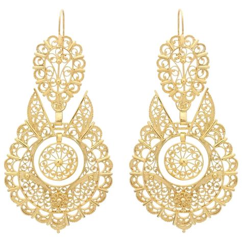 For Sale on 1stDibs - Handmade Portuguese Filigree 925 Golden Silver Queen Earrings - Materials & Techniques: Golden Silver 925 - Date the piece was created: 21th century - Queen Earrings, Gold Filigree Earrings, Filigree Jewelry, Filigree Earrings, Earrings Clip, 925 Silver Earrings, Gold Filigree, Mesopotamia, Antique Earrings