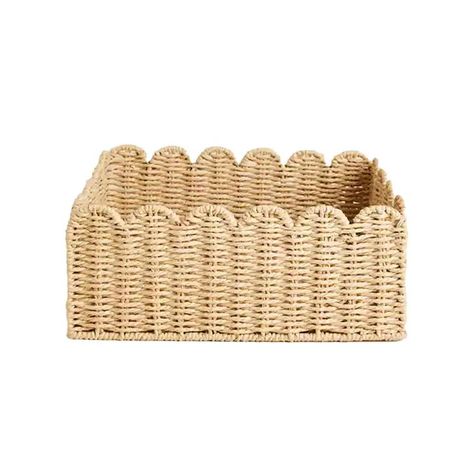 Cup of Jo's Joanna Goddard Shares Her Living Room Essentials Small Table Basket, Cute Boho Basket, Fisher Gift Basket, Wicker Linen Basket, Small Rattan Baskets, Cute Boho Baskets, Basket With Pillow And Throw, Bathroom Wicker Basket, Themed Basket For Raffle