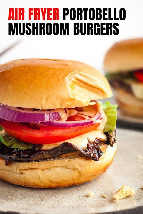 If you're looking for vegetarian burger ideas, you really can't go wrong with a great mushroom burger. And juicy, flavorful portobello mushroom burgers are a breeze to make in your air fryer! With a delicious garlicky marinade and melted cheese, these are so satisfying that no one will miss the meat. Easy to make vegan too. Mushroom Cap Burger, Mushroom Smash Burger, Portabella Mushroom Burger Air Fryer, Portabella Burger, Portobello Burger Recipe, Portabella Mushroom Burger, Eggplant Burger, Vegan Mushroom Burger, Mushroom Swiss Burger