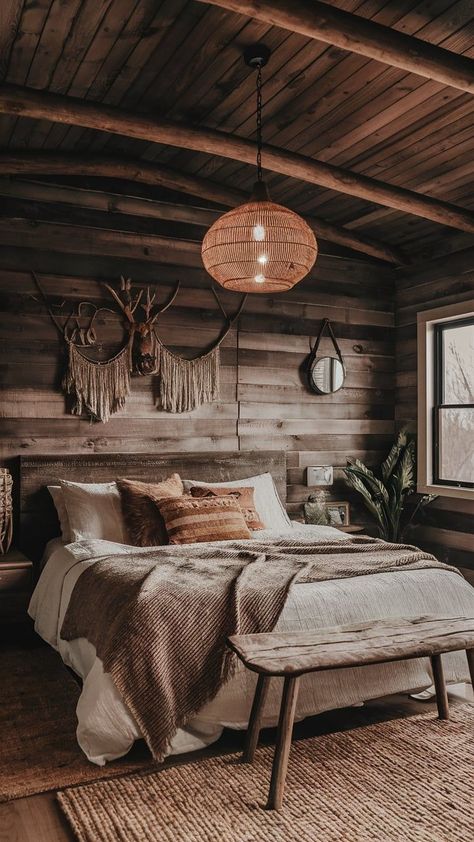 hink cabin vibes with a boho flair—perfect for a cozy, inviting bedroom. Wood Boho Bedroom, Boho Cabin, Cabin Vibes, Inviting Bedroom, Boho Style Bedroom, Style Bedroom, Hanging Light, Wood Accents, Boho Bedroom