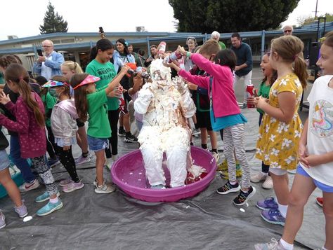 Sutter Elementary School in Santa Clara celebrated its over-the-top successful 2022 walkathon fundraiser by plastering Principal Michael Fong and Instructional Coach Annie Stephanos with layers of drippy, gooey ice cream sundae toppings...For more updated news visit SVVOICE. Walkathon Fundraiser, Ice Cream Sundae Toppings, Ice Cream Sundaes Toppings, Sundae Toppings, Ice Cream Sundaes, Friend Jokes, School Enrollment, School Leadership, You Are My Friend