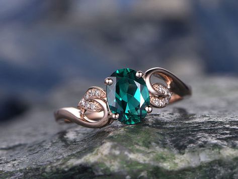 Vintage emerald engagement rings