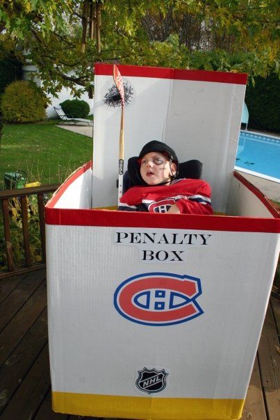 Penalty Box wheelchair Halloween hockey costume Hockey Penalty Box Diy, Wheelchair Decor, Hockey Costume, Backyard Rink, Wheelchair Costumes, Hockey Birthday Parties, Hockey Halloween, Kids With Disabilities, Hockey Decor