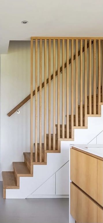 Slats On Staircase, Vertical Slats Staircase, Wooden Slat Staircase, Slat Railing Stairs, Slatted Banister, Slats On Stairs, 70s Bannister, Wood Slats Stairs, Modern Stair Balustrade