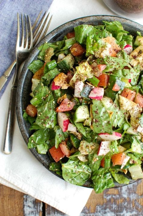 A healthy Middle Eastern Salad with a light, lemony vinaigrette dressing. This salad mixes crisp romaine, fresh vegetables, pita chips and a light lemony sumac dressing and is great with fresh farmers market vegetables. // A Cedar Spoon Fatoosh Salad, Sumac Dressing, Middle Eastern Salad, Middle Eastern Salads, Salad Mixes, Fattoush Salad, Salad Pasta, Vinaigrette Dressing, Asian Foods