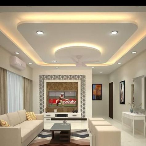 Latest Modern Living Room False Ceiling Design Ideas 2023 | POP False Ceiling Design Is your living room looking a bit dated? Check out these latest Modern Living Room False Ceiling Design Ideas 2023 | POP False Ceiling Design ideas to refresh your space! From bold to subtle, these designs will create a striking impact on your home. Whether you're looking for a dramatic change or something more subtle, these designs will have you looking forward to sitting down in your living room again! Best False Ceiling Designs, Latest False Ceiling Designs, Pop Design For Hall, Simple False Ceiling Design, Gypsum Ceiling Design, Bedroom Pop Design, Simple Ceiling Design, Down Ceiling Design, New Ceiling Design