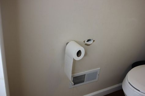 How To Cover a Hole  With a Farmhouse Toilet Paper Holder ($2 Lumber) Fix Hole In Wall, Farmhouse Toilet Paper Holder, Farmhouse Toilet, Diy Teepee Tent, Bar Stool Makeover, Pressed Tin Ceiling, Diy Toilet Paper Holder, Hidden Toilet, Bathroom Chair