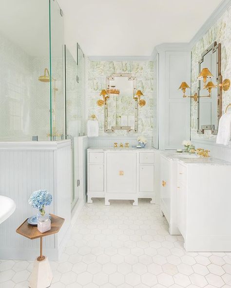 Bathroom with blue wainscoting and green scenic Sanderson wallpaper, monogrammed Weezie towels, and a Colefax and Fowler Bowood print chair by Tori Alexander of Alexander Interiors in Nashville. Blue And Green Bathroom, Bath Renovation, Bad Inspiration, Marble Vanity Tops, White Cottage, Green Bathroom, Traditional Bathroom, Free Standing Bath Tub, Beautiful Bathrooms