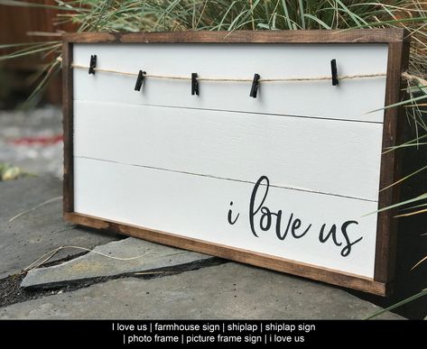 I love us This 9”x18” sign is a perfect addition to your farmhouse home decor. It features a faux white shiplap, dark charcoal lettering, twine and 5 black mini clothes pins to showcase your favorite photos. This is a perfect gift to a loved one or just something special for yourself! ***Please keep in mind that the natural wood grain and knots accentuate the character of the wood, making each sign one of a kind. These signs are distressed and ar Husband Cricut Gifts, Modern Wood Signs Decor, I Love Us Wall Decor, Diy Mini Wood Signs, Cute Home Decor Signs, Wooden Signs For Bedroom, Small Decor Signs, Make Yourself At Home Sign, Shiplap Craft Ideas