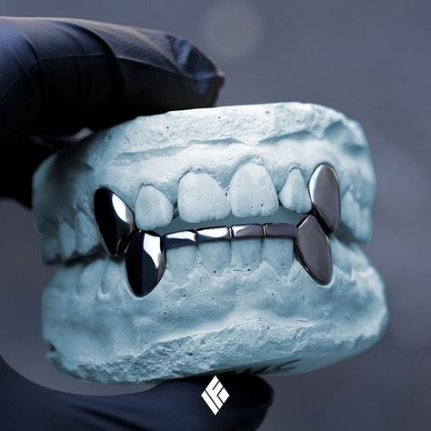 Solid 14K Black Gold Top 2 Canines & Bottom 6 Grills With Bottomless Mids. Custom made for @mercesus_war 💎 #Grillz #BlackGold #GoldTeeth #CustomJewelry #IFANDCO Canine Grillz, Grillz Teeth, Diamond Grillz, Gold Grillz, Grills Teeth, Black Gold Jewelry, Gold Teeth, Teeth Jewelry, Black Men Hairstyles