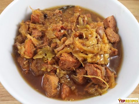 Bigos aka Polish Hunter's Stew - A hearty Polish dish made with kielbasa and pork then stewed with sauerkraut and cabbage. #yeprecipes #recipes #polish #stew Bigos Stew, Polish Hunters Stew, Polish Stew, Pork Stew Meat, Hunters Stew, Mutton Meat, Kielbasa Sausage, Pork Stew, Pork Ham