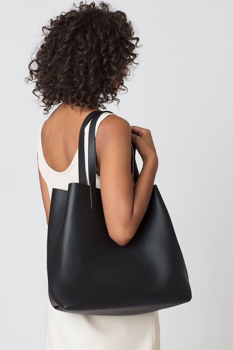 The 5 Most Impactful Things $200 Can Buy Stone Outfit, Tote Organizer Insert, Cuyana Tote, Face Construction, Architectural Aesthetic, Classic Leather Tote, Fall Winter Capsule Wardrobe, 50th Clothing, Black Ankle Pants