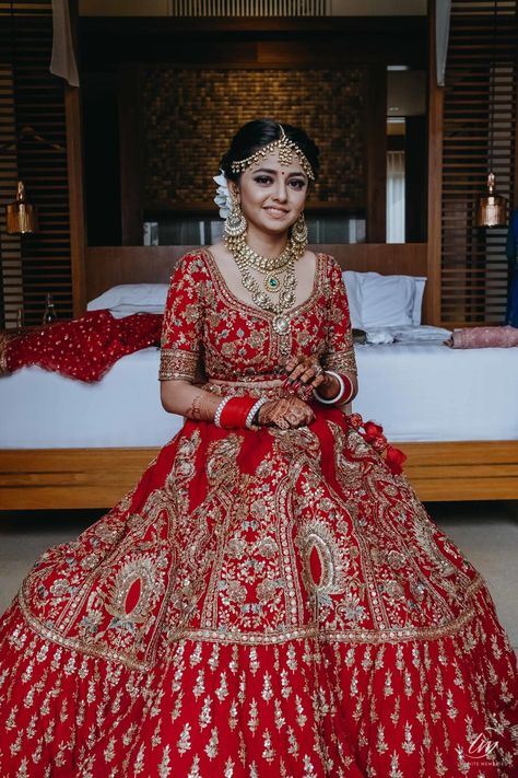 Red bridal lehenga with heavy work paired with light jewelry  #bride #bridalwear #bridallehenga #lehenga #indianwedding #weddingoutfit #red #jewelry #bridaljewelry #shaadisaga Rajputana Dress, Karan Preeta, Red Wedding Lehenga, Kajol Saree, Bridal Aesthetic, Indian Wedding Lehenga, Designer Bridal Lehenga Choli, Bridal Songs, Wedding Lehenga Designs