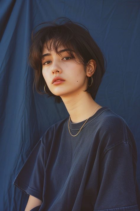 #FashionModel #DarkBlueBackdrop #ShortHair #JapaneseGirl #OversizedT-shirt #IndigoGray #90sAesthetic #KodakGoldFilm #2:3AspectRatio #TheCandie Kodak Gold Film, 90s Aesthetic Fashion, Japanese Short Hair, Woman Posing, Kodak Gold, Really Short Hair, Blue Backdrop, Japanese Hairstyle, Plain T Shirt